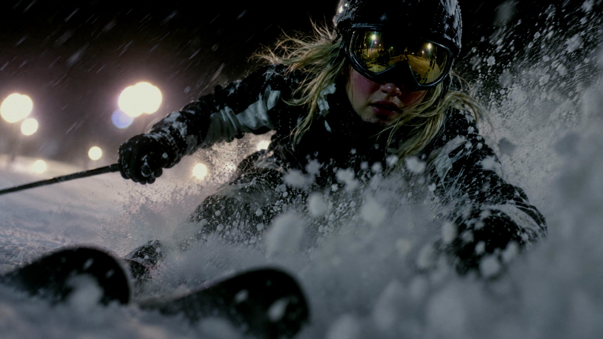 Margaux carving through powder