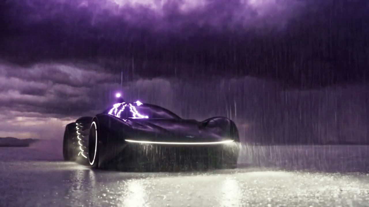 The car alone in the rain, charge crawling over its blades