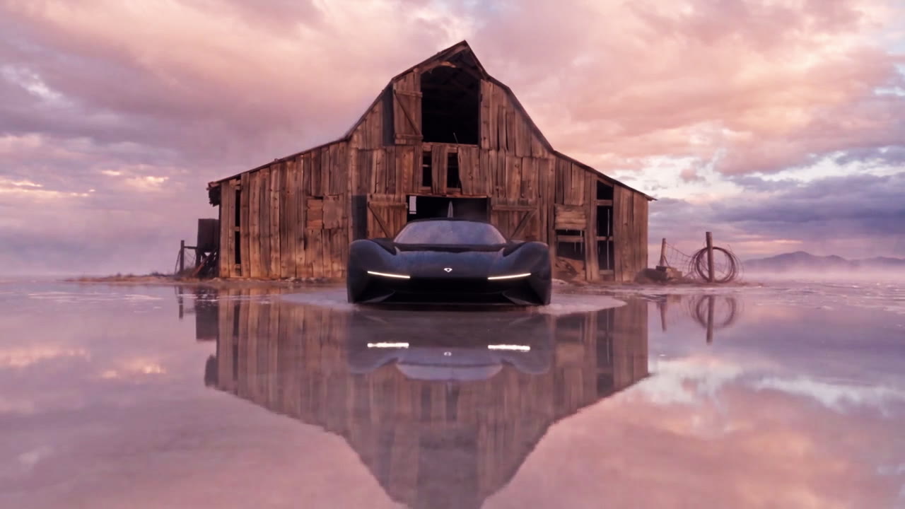 The car home at the barn, reflected in the wet salt at dawn