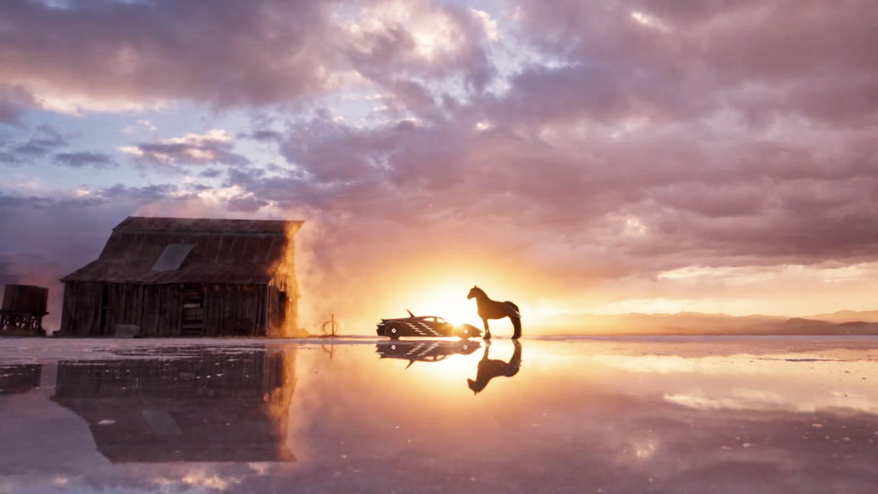 Horse and car silhouetted against the sunrise